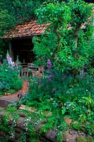 RHS Chelsea Flower Show 2014 - The DialAFlight Potter's Garden - Nature Redesigned. Designers Francesca Murrell & Emma Page. Artisan Garden
