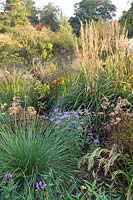 Cambo Walled Garden, Fife, Scotland, UK ornamental potager garden, drift planting, orchard, autumn