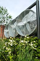 Winds of Change garden by Jamie Dunstan at RHS Chelsea Flower Show 2011. Domestic wind turbines