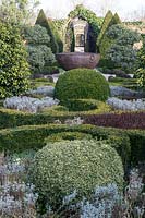 Abbey House Gardens, Malmesbury, Wiltshire.  Topiary garden in winter showing structure and form