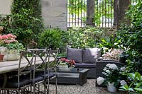 Palazzo Malenchini, Florence, Italy, chic courtyard garden with dining furniture