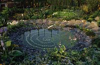 Hampton Court FS 1999 Design Karen Maskell Pool with spiral stone pattern Hekexine lawn