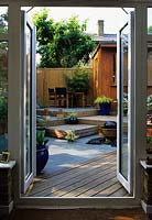 private garden London Design Christine Fitzsimmons small town patio garden with split levels water feature seating