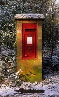 postbox in winter with snow