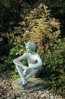 Denmans Sussex seated figurative sculpture by Marion Smith
