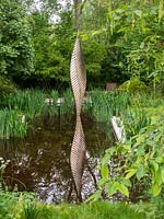 David Harbers bronze sculpture in The Savills and David Harber Garden. Designed by Andrew Duff, Sponsored by David Harber Savills, RHS Chelsea Flower Show, 2019.
