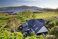 House with view to Loch Tuath and Isle of Ulva, Isle of Mull, Argyll, Scotland, UK
