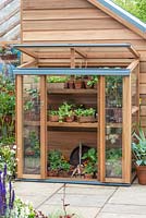 Wooden cold frame for hardening off young plants - RHS Chelsea Flower Show 2018