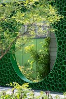 View of the 'Peavilion' made from aluminium tubing -The Seedlip Garden, Sponsor: Seedlip, RHS Chelsea Flower Show, 2018.
