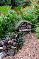 Bug chalet. Pam Woodall's garden, 'Pinecombe' in Dorset, UK