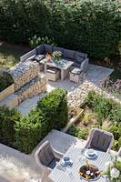 View from above of seating areas in multi-level garden. 