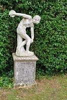 Reproduction of a classical sculpture inside a maze of privet hedges that provides protection from prevailing winds