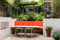 View of sunken seating area in multi-level contemporary garden.