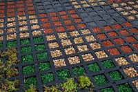 Porous paving using different coloured gravel chips
