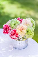 Mixed arrangement of Perpetual carnations.