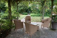 Patio area with outdoor furniture in the Garden of the Auberge de Launay, near Amboise, Loire Valley, France