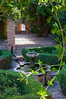 Water feature in quiet gardens of the  Alcazaba Hilltop Citadel in Malaga, Andalucia, Spain


