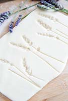 Salt dough with impressions of pressed lavender flowers 