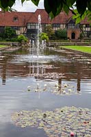 RHS Wisley - Lily Pond with Laboratory and offices building behind