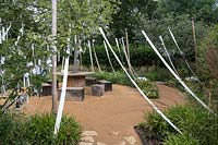 Cultiver les Reves, Grow Your Dreams, Festival International des Jardins 2019, Domaine de Chaumont sur Loire, France. Wishing trees and a tree of life, bearing white ribbons, the symbol of purification in the Old Testament.
