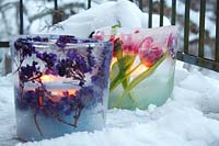 Winter decorations - frozen ice sculptures with flowers and lights