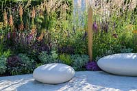 Polished concrete pebble seats. The Cancer Research UK Pledge Pathway to Progress. RHS Hampton Court  Palace Garden Festival, 2019.