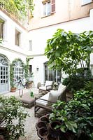The internal courtyard of the terrace transformed into a cool and shady garden