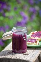Homemade blueberry curd in a kiln jar