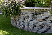 Granite wall with coping