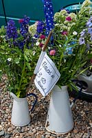 Jugs of cut garden flowers for sale at roadside - Open Gardens Day, Cratfield, Suffolk