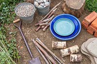 Tools and materials required to construct a sensory garden
