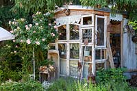 Garden shed created from recycled windows and finds. 