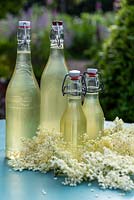 Bottles of homemade elderflower cordial