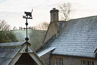 Cat and mouse weathervane at the Old Rectory, Netherbury, UK. 