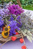 Trug of dried flowers including Statice, Sea lavender, Grasses and Chinese lanterns