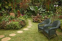 Wicker chairs and circular paving stones 
