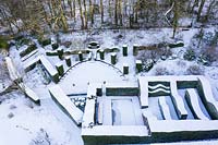 Drone overhead view of snow covered formal garden.  Garden â€“ Veddw