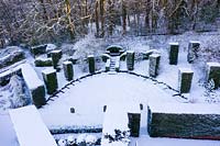 Overhead view of formal country garden covered in snow. Garden â€“ Veddw


