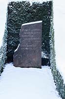 Memorial stone in the hedge garden carved by Caitriona Cartwright. Garden - Veddw 
