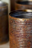 Close up detailed shot of rusty tin cans