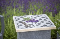 Lavender and scissors on stone slab table