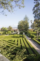View over the formal parterre of lines of clipped Box hedges. Lisbon, Portugal, September.