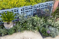 Aerial view of Mediterranean style garden with painted wall