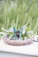 Scented wreath lying on table