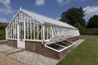 Large traditional greenhouse with cold frame alongside