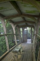 Wooden bridge designed by Matt Robinson at Caervallack Garden, Cornwall