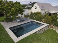 Aerial view of elevated swimming pool in back garden