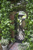 The Trompe l'oeil Angel Gate with mirror at Hamilton House garden in May 
