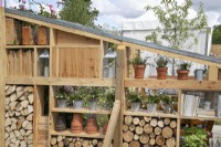 Outdoor storage space in #knollingwithdaisies garden at RHS Hampton Court Palace Garden Festival 2022