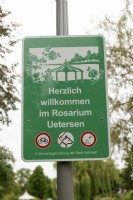 Uetersen Germany
Herzlich willkomen im Rosarium Uetersen. 
welcome sign with rules, no cycling, dogs on a lead and dont feed the wildfowl 